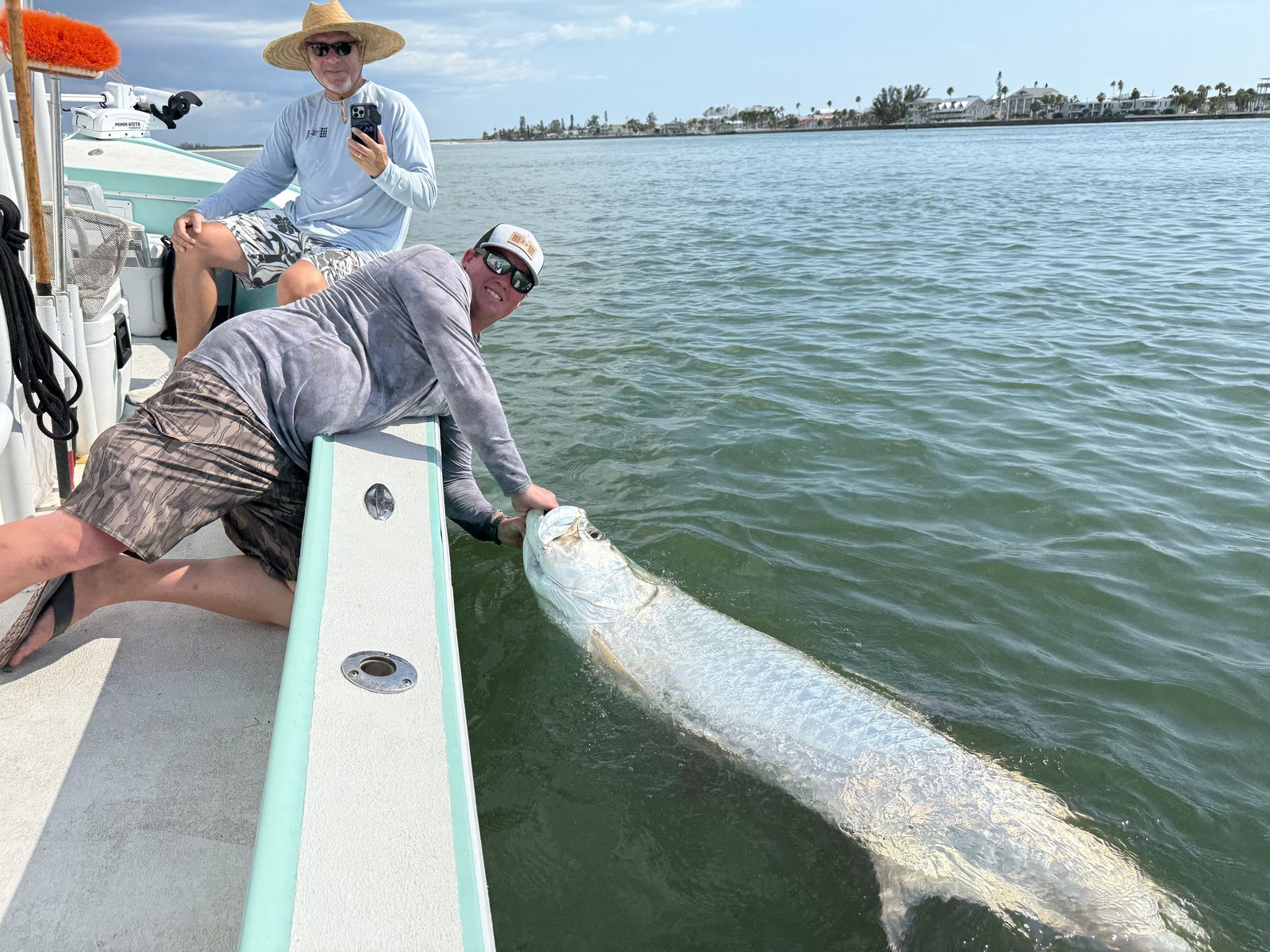 A tarpon held boatside before release in Tampa Bay