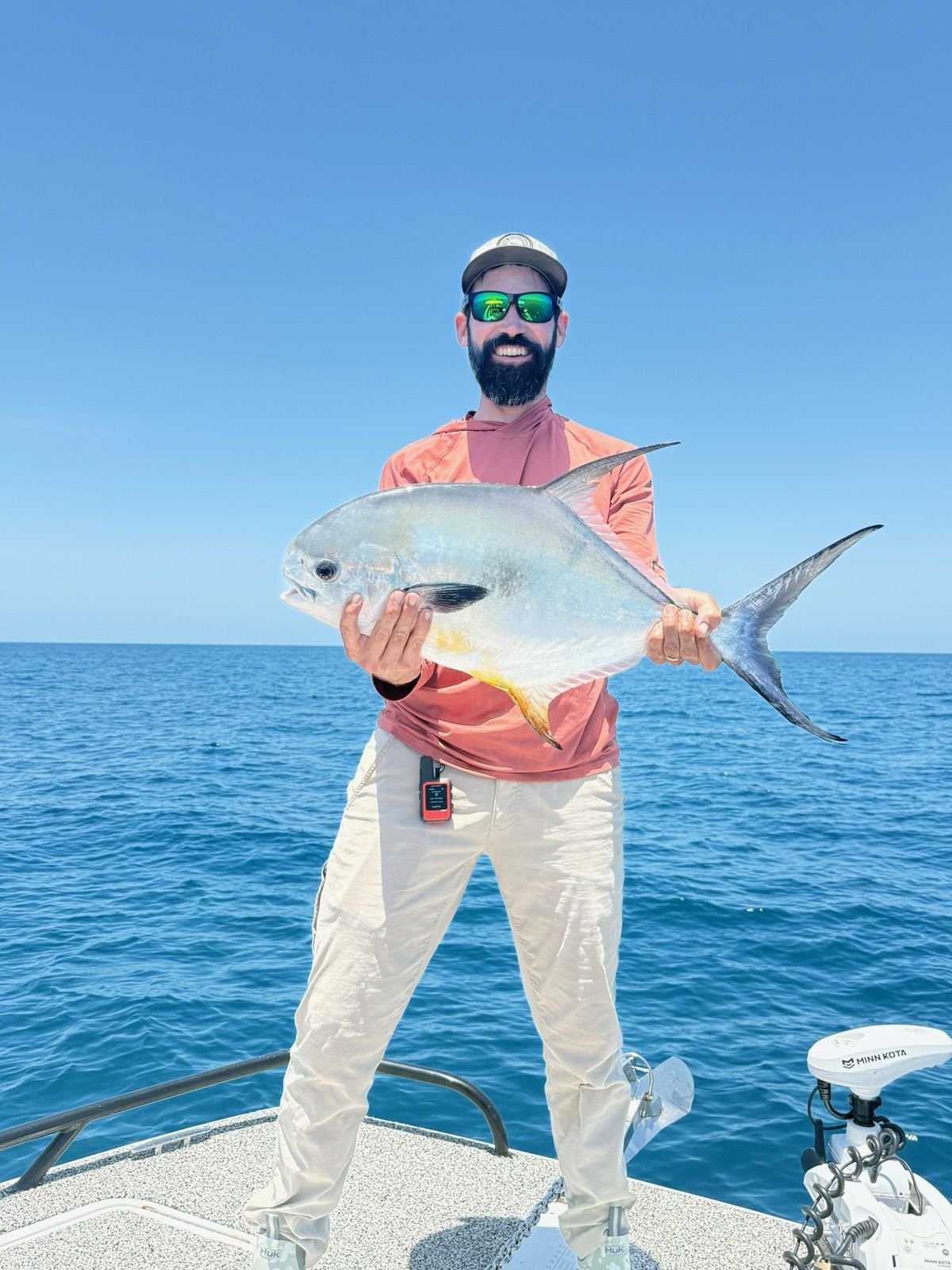 A guest holding a permit on the bow out of Saint Petersburg